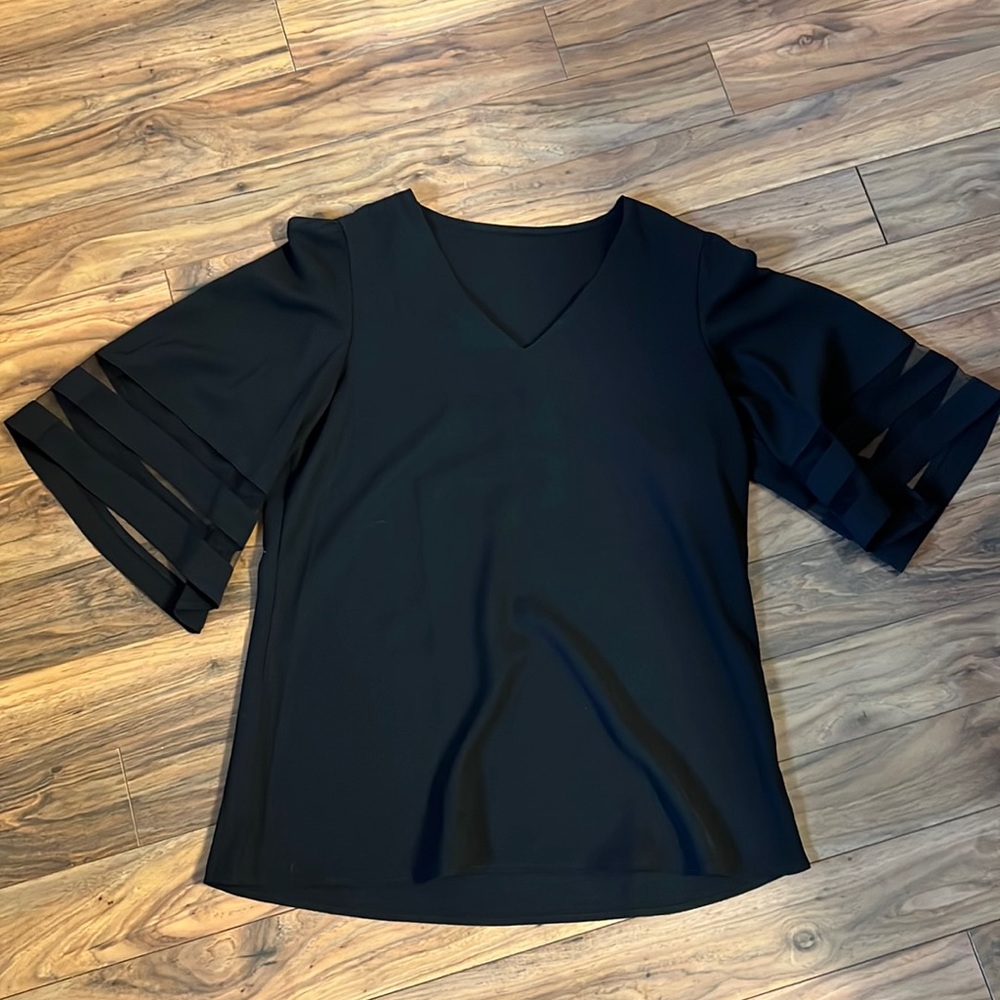 Black dressy top.